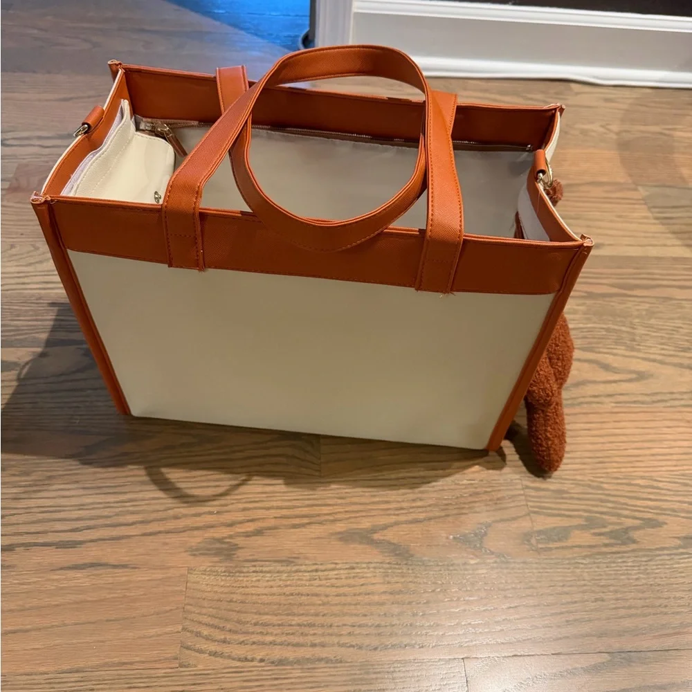 Orange and Cream Pet Carrier with Plush Toy